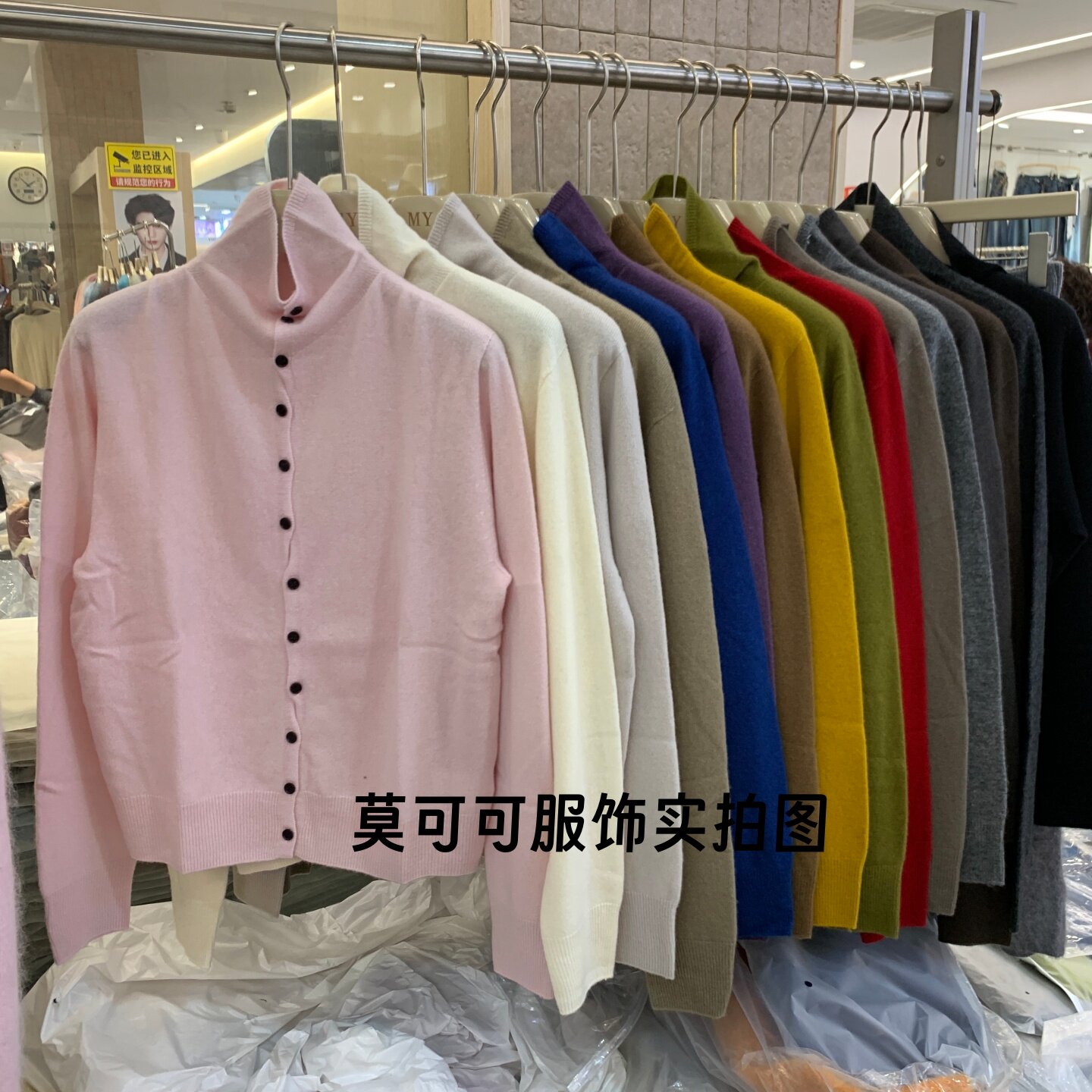 无缝一体半高领扭扭扣针织开衫女