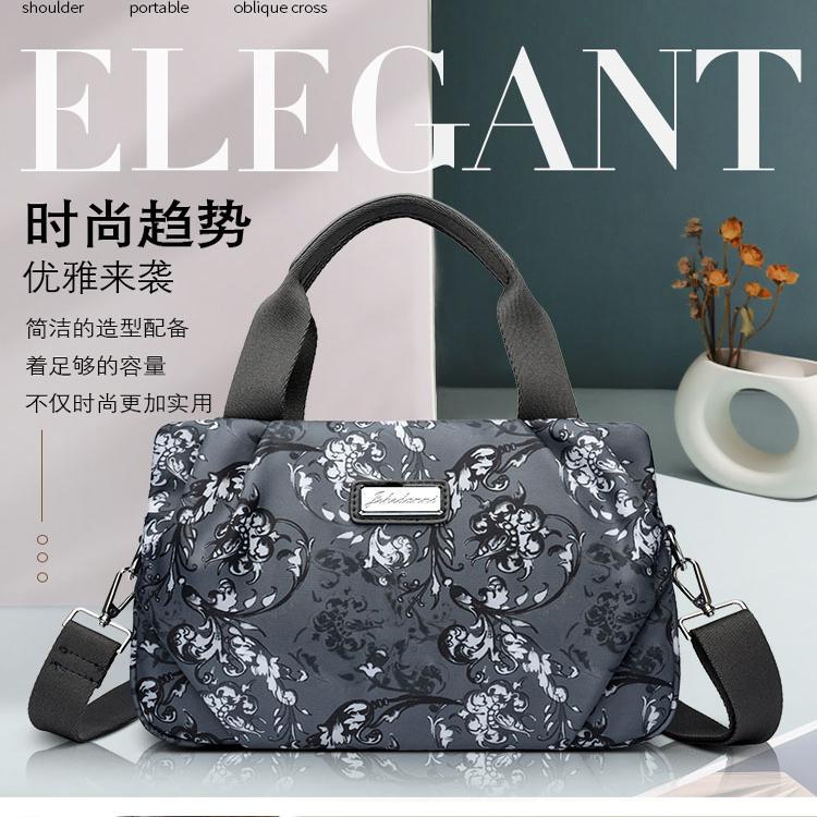 杰克丹妮新款大容量防水牛津布女包多层手提单肩两用欧美时尚布包