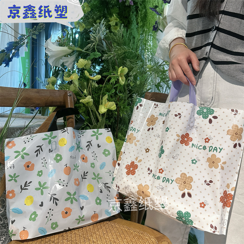 新款清新花朵服装店袋子塑料袋手提包装购物袋女装袋礼品袋定做
