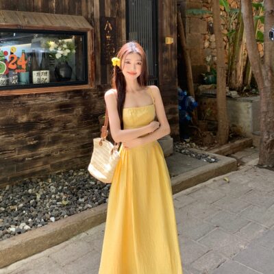 温柔风黄色连衣裙女春季海边度假风吊带裙氛围感裙子气质a字长裙