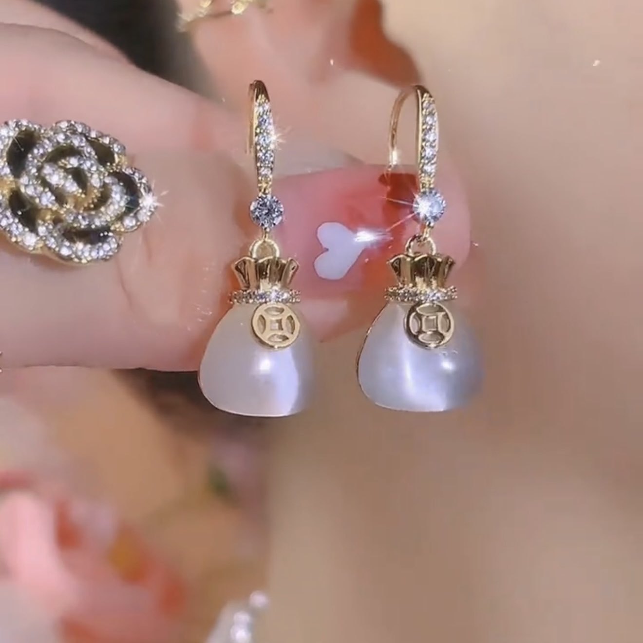 BF2025款耳饰 新中式设计小众钱币猫眼福袋耳钩高级感小众耳环