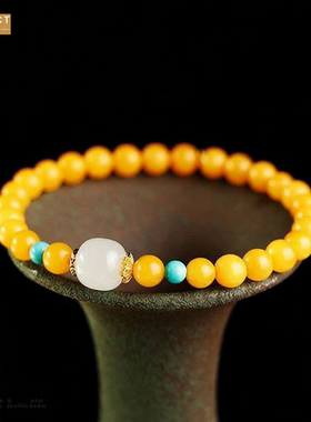 XKDDCT鸡油蜜蜡手链招时吊牌桃花