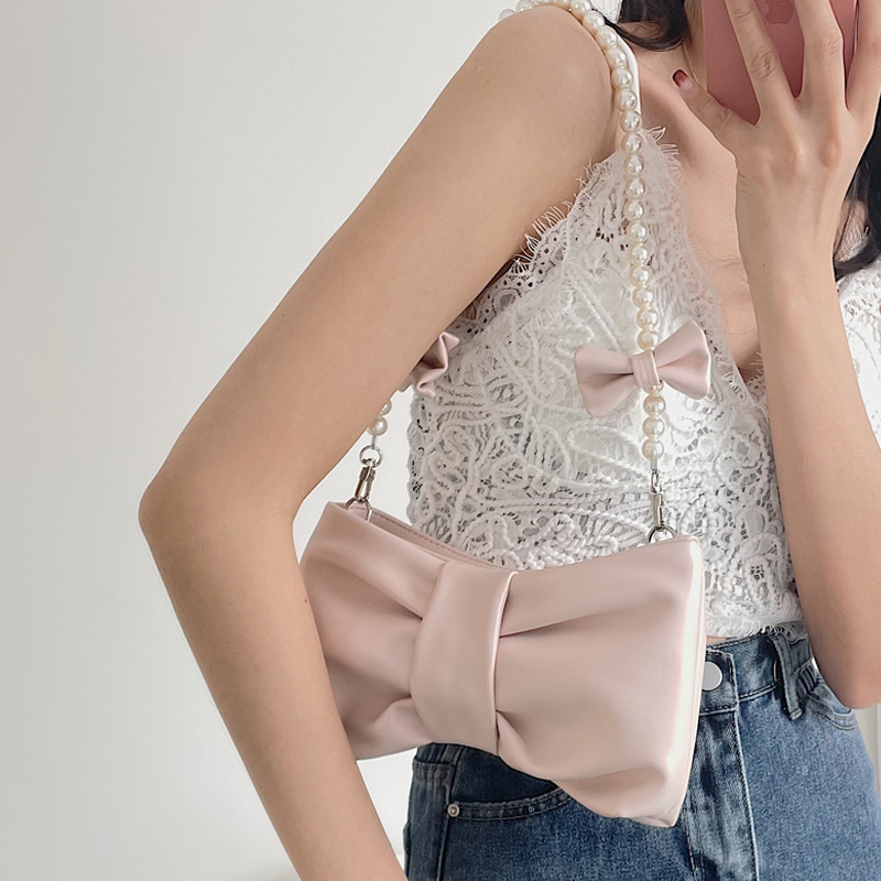 蝴蝶结仙女珍珠单肩斜挎腋下包