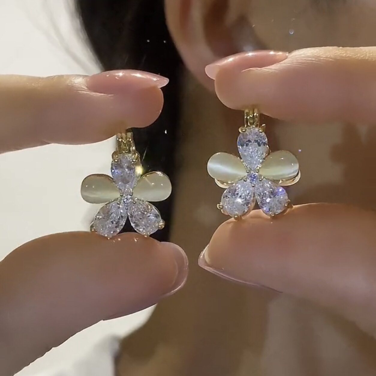 925银针花朵猫眼石耳环女