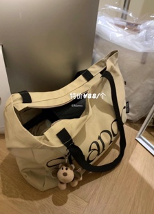 METWO 设计通勤欧式文艺字母托特包学生电脑书百搭休闲单肩帆布包