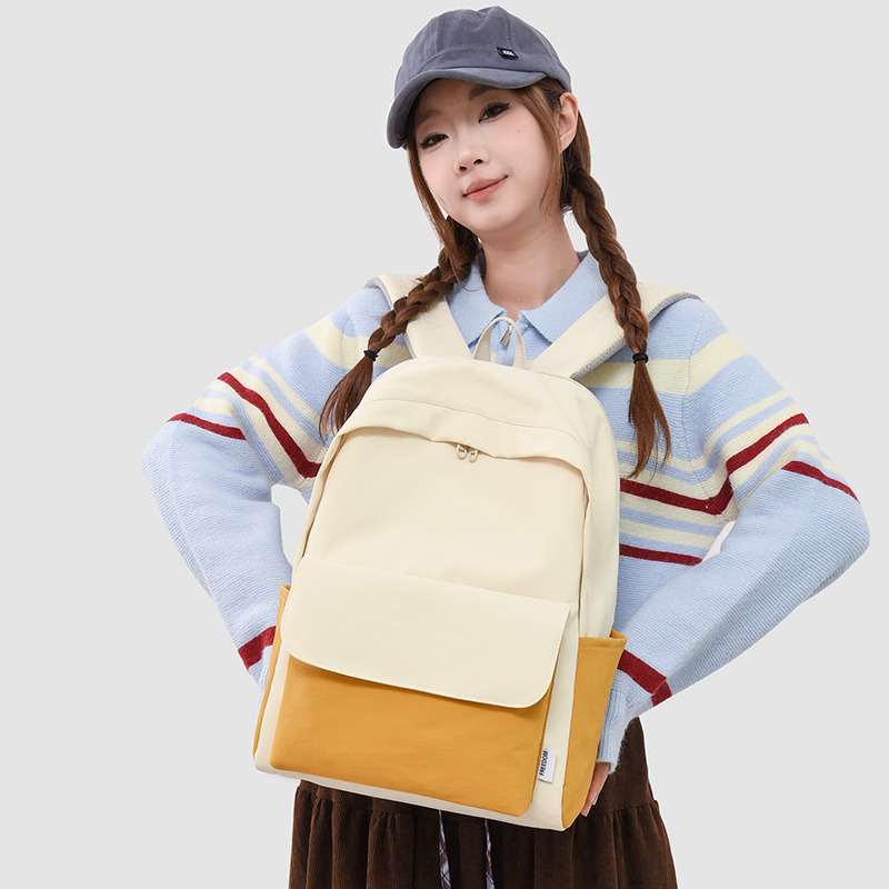 简约撞色双肩包女大容量轻便背包大学生书包2025新款初高中生背包