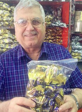 现货 迪拜特产Arabian Delights牛奶巧克力椰枣夹心杏仁 散装500g