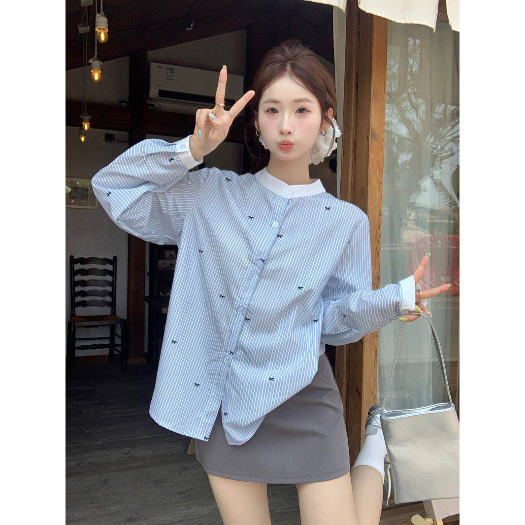 2026新款韩系蓝白条蝴蝶结印花长袖衬衫女慵懒设计感气质圆领上衣