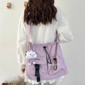 多口袋大容量抽绳布包女2026新款 休闲学生斜挎包逛街通勤单肩包潮