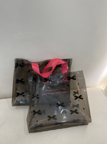 透明黑色蝴蝶结服装店礼品袋手提袋包装袋衣服购物袋塑料袋子定制