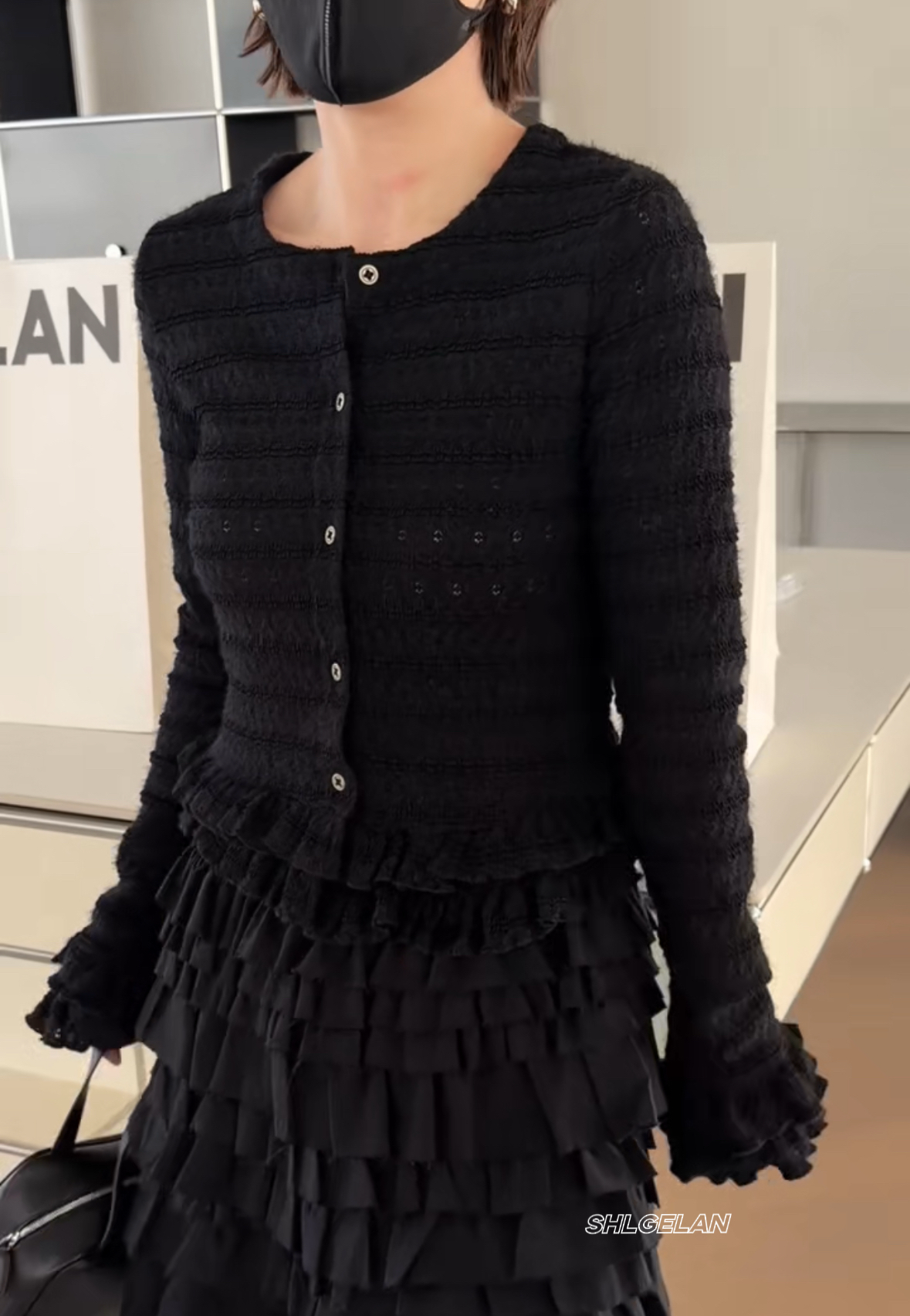 853花纹上衣 诗歌兰欧货2026春款气质显瘦黑色木耳边镂空针织衫女