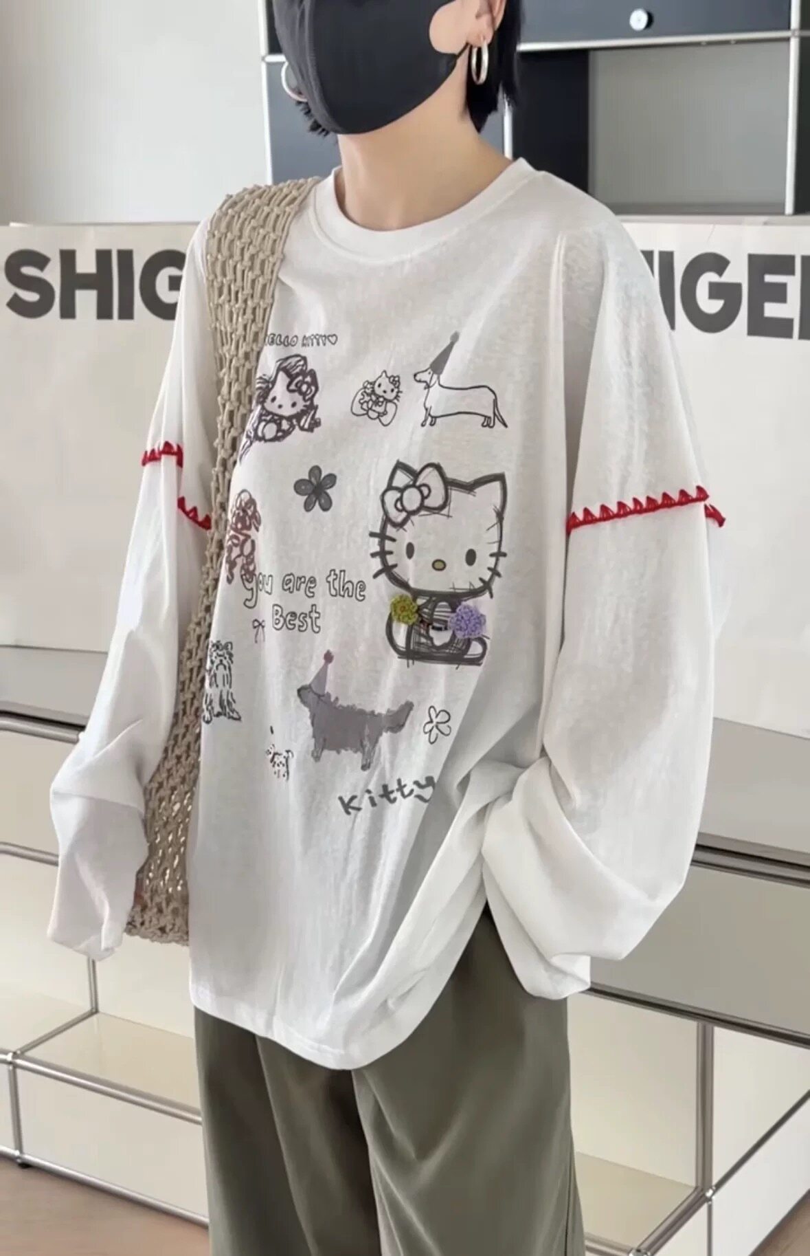 诗歌兰女装2026春款 9161韩系甜美可爱涂鸦卡通印花T恤女