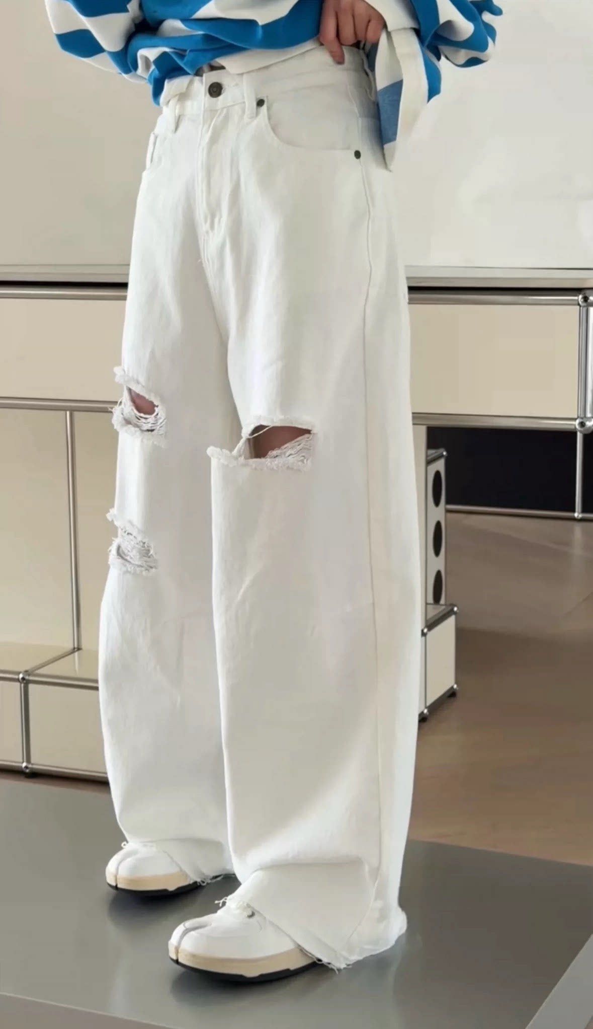 诗歌兰女装2026春款 3659潮流个性时髦简约破洞裤毛边牛仔裤