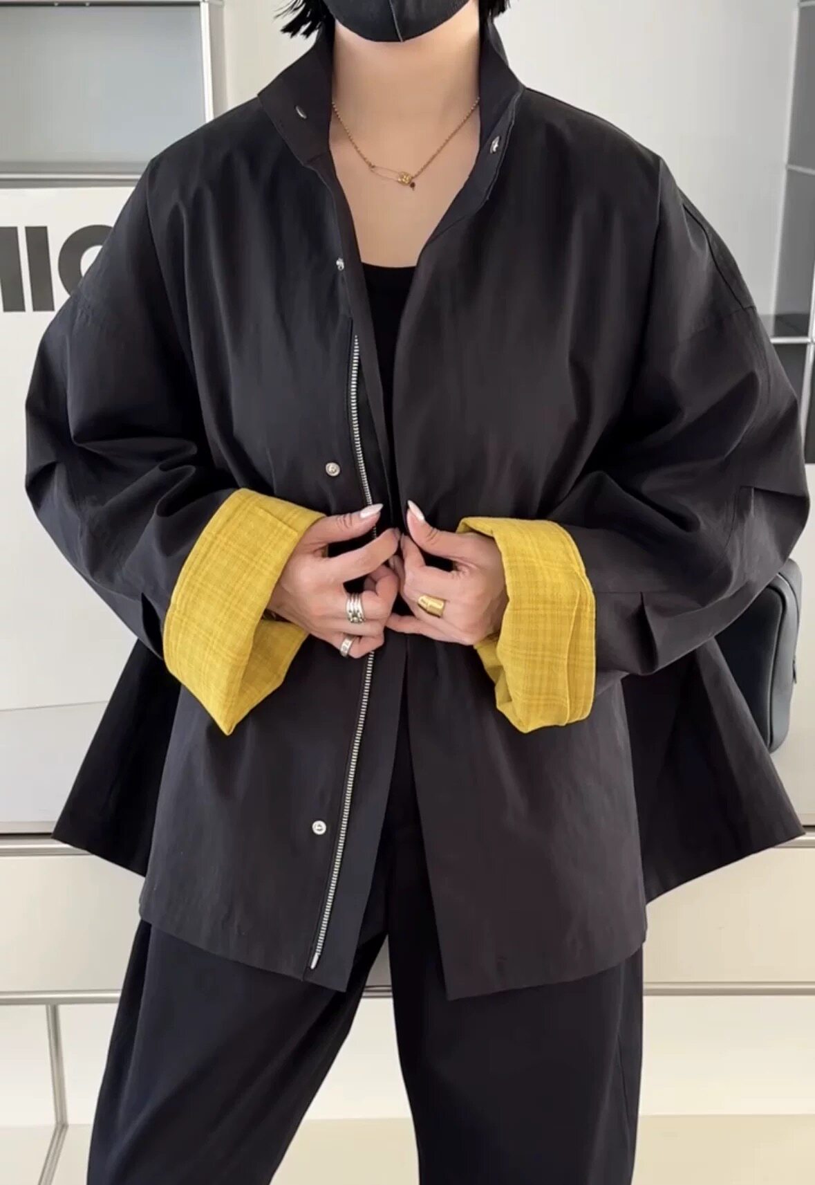 诗歌兰女装2026春款 266020优雅休闲时髦简约拼色翻边袖风衣外套