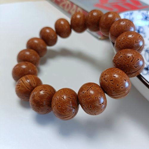精品红魔野生桃核手串光珠算盘