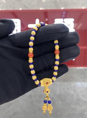 周大福龙腾鼓跃黄金青金石手链