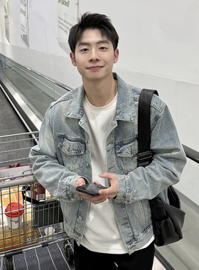 蓝色纽扣牛仔夹克春秋季男生2025新款翻领宽松休闲上衣外套口袋