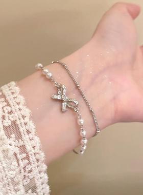 磨砂满天星手链女2025新款轻奢小众精致蝴蝶结双层叠戴珍珠手饰
