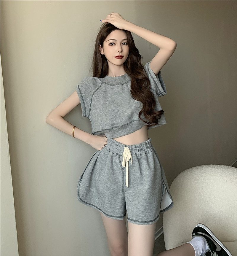 Two piece round neck short sleeve top and high waist drawstring shorts