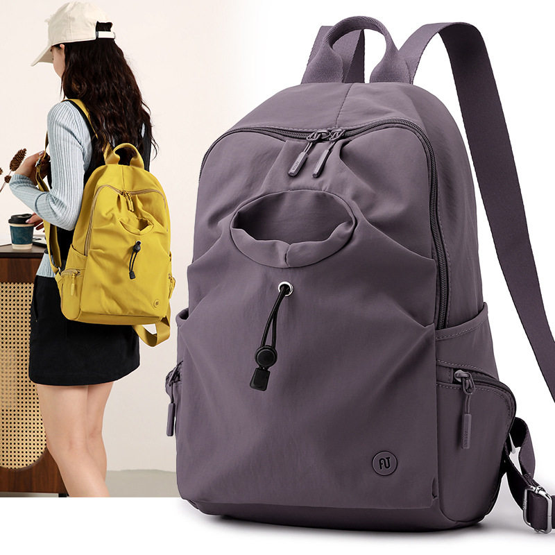 前置二侧三个水杯壶位游玩减负拉杆插带男女双肩背通勤小书包轻便