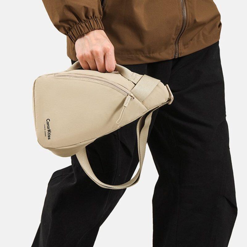 2026三角形斜挎胸包男士外出装IPADMINI伞手机的单肩后背便携小包