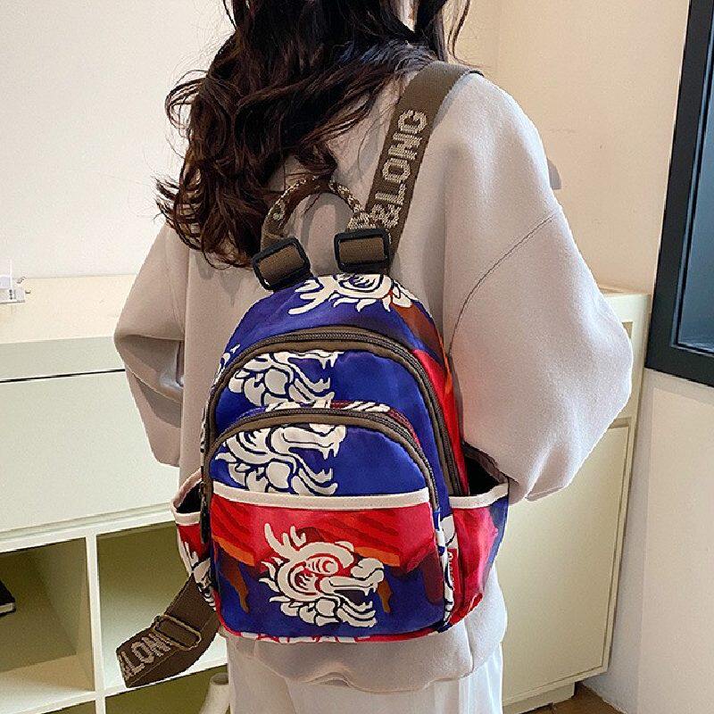 2026国风虎龙图案轻便防泼水小巧便携男女游玩双肩9.7寸平板伞包