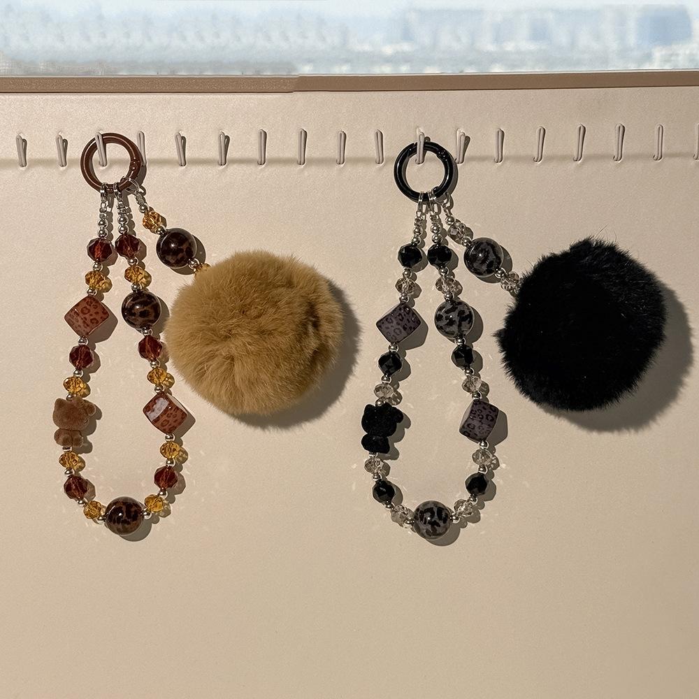 时尚真兔毛毛球豹纹串珠手机壳挂链时尚潮女植绒KT包包钥匙扣挂饰