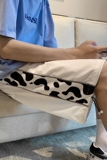 港风夏季奶牛纹拼接反光条五分短裤XZ604-KG17-P28控38，男装牛仔裤，星座604