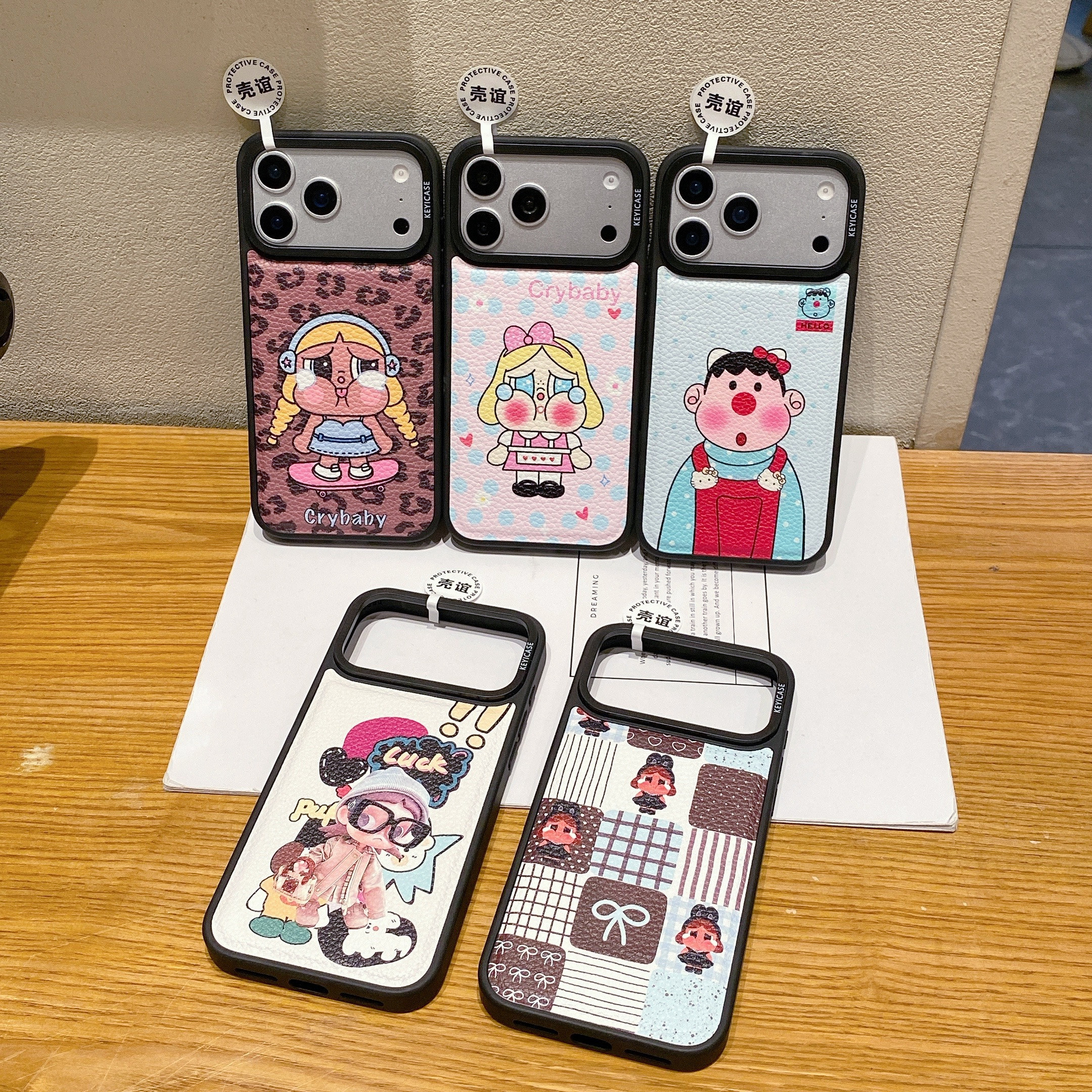 卡通黑边框荔枝皮纹苹果17手机壳