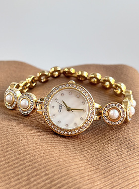 新式手链表小众高颜值轻奢贝珠女表高级感贝母面石英手表
