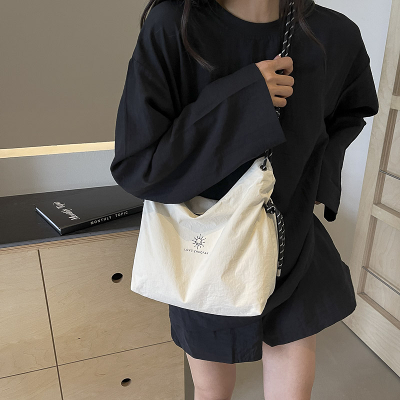 休闲通勤托特包女2024新款日系百搭单肩斜跨包学生上课尼龙布袋包