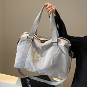 大容量手提旅行包女轻便防水行李包男短途出差收纳游泳包健身包女