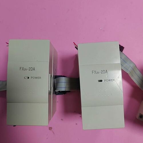 三菱FX2N2DA拆机如下图实物拍摄功能包好盖板议价