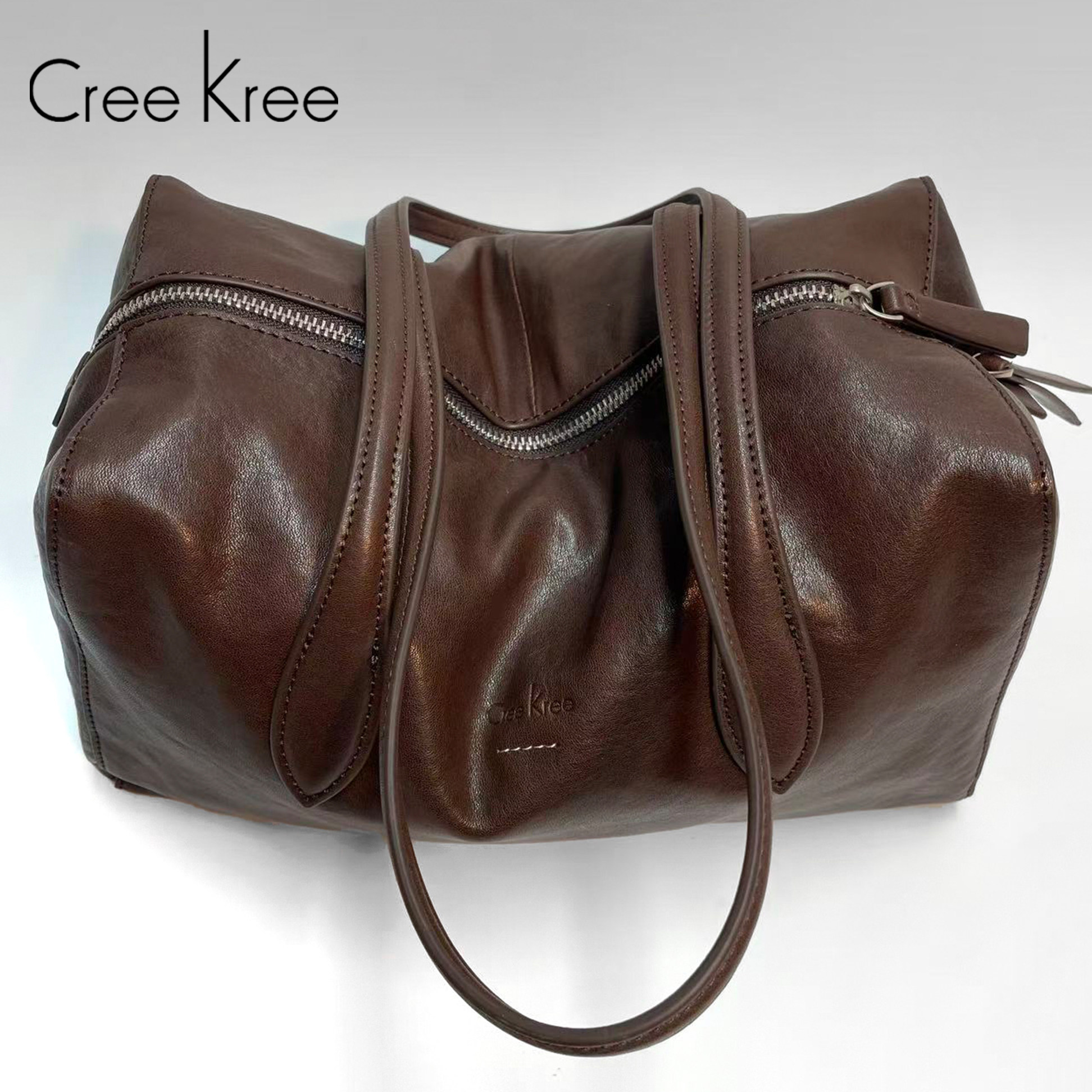 西班牙Creekree极简风软通用款女包