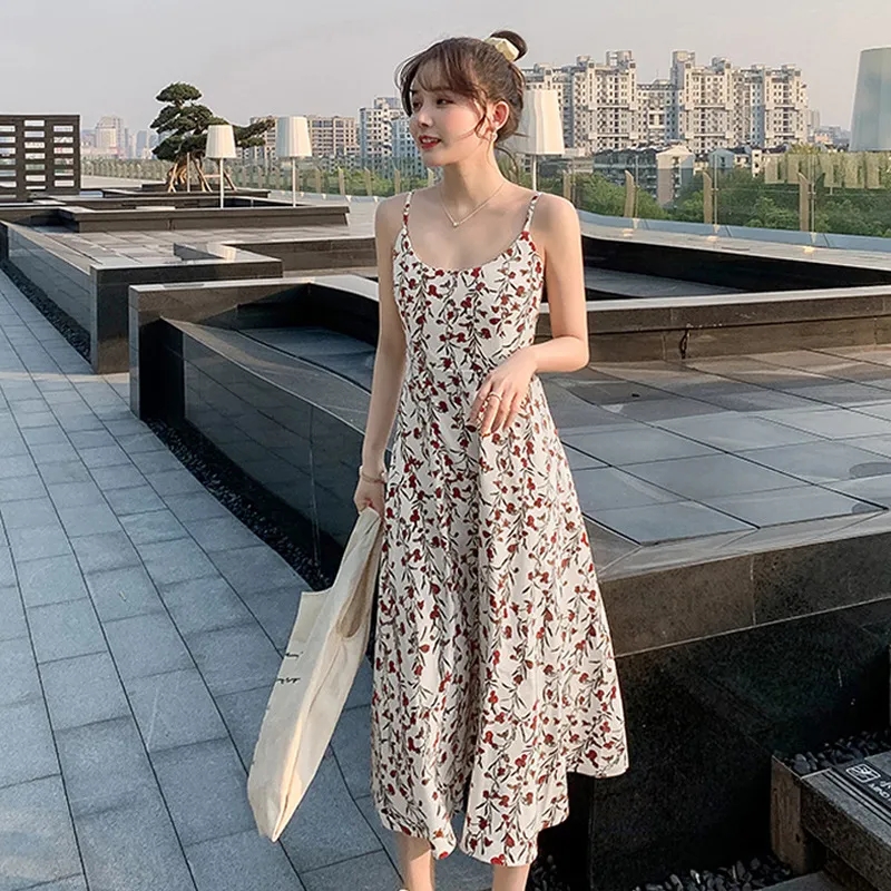 Floral suspender dress women's new spring and summer season imitation ice silk word skirt Korean mid long skirt slim fashion