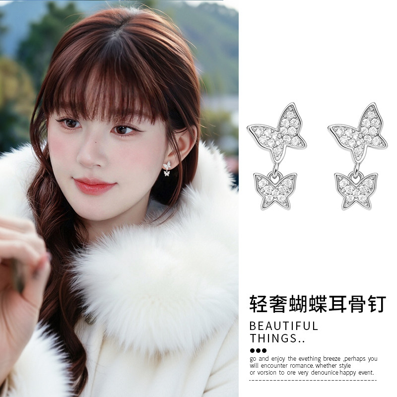 银色超闪蝴蝶结耳环女款高端轻奢医用级钛钢针耳骨钉独特气质耳饰
