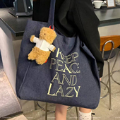 蜗牛爬爬慵懒风牛仔帆布包大容量通勤托特包小众简约百搭单肩包女