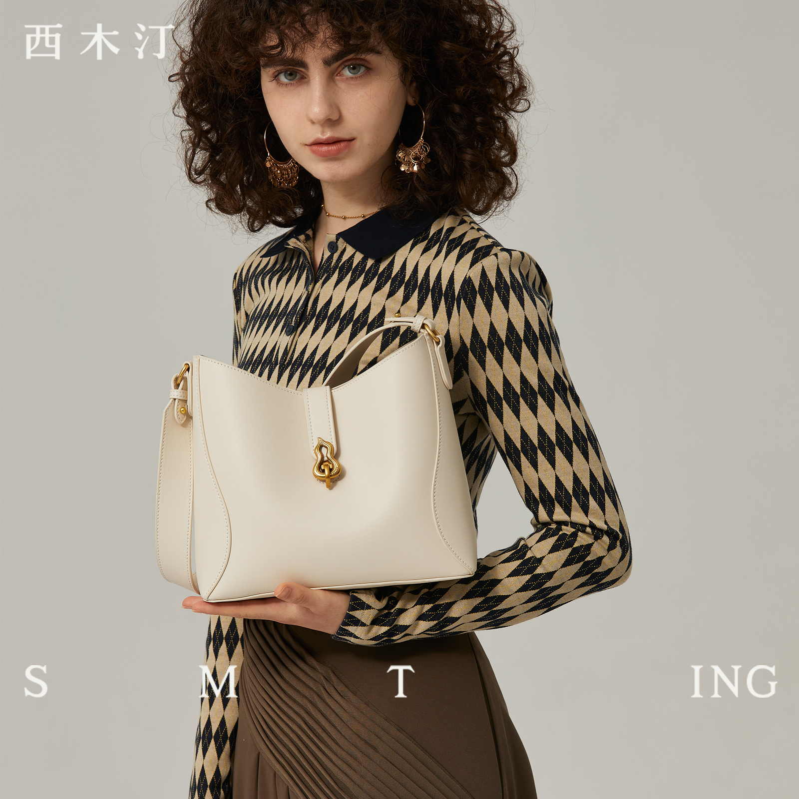 西木汀小众牛皮水桶包女大容量