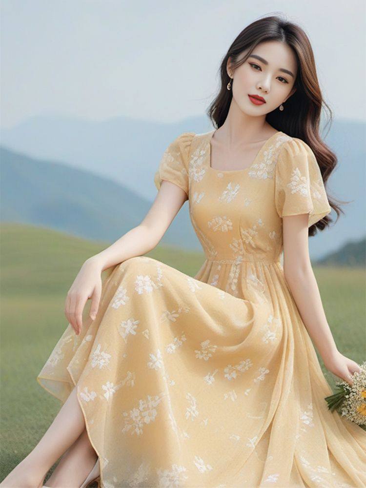 2025夏季新款女装黄色碎花连衣裙女短袖宽松显瘦气质优雅中长裙