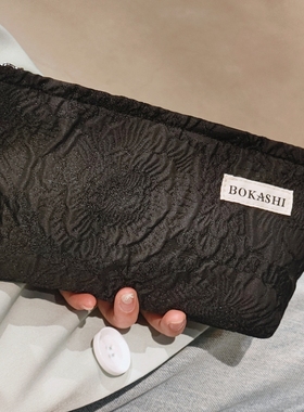 黑色赫本风便携式高奢化妆包女大容量2025新款高级感外出收纳包