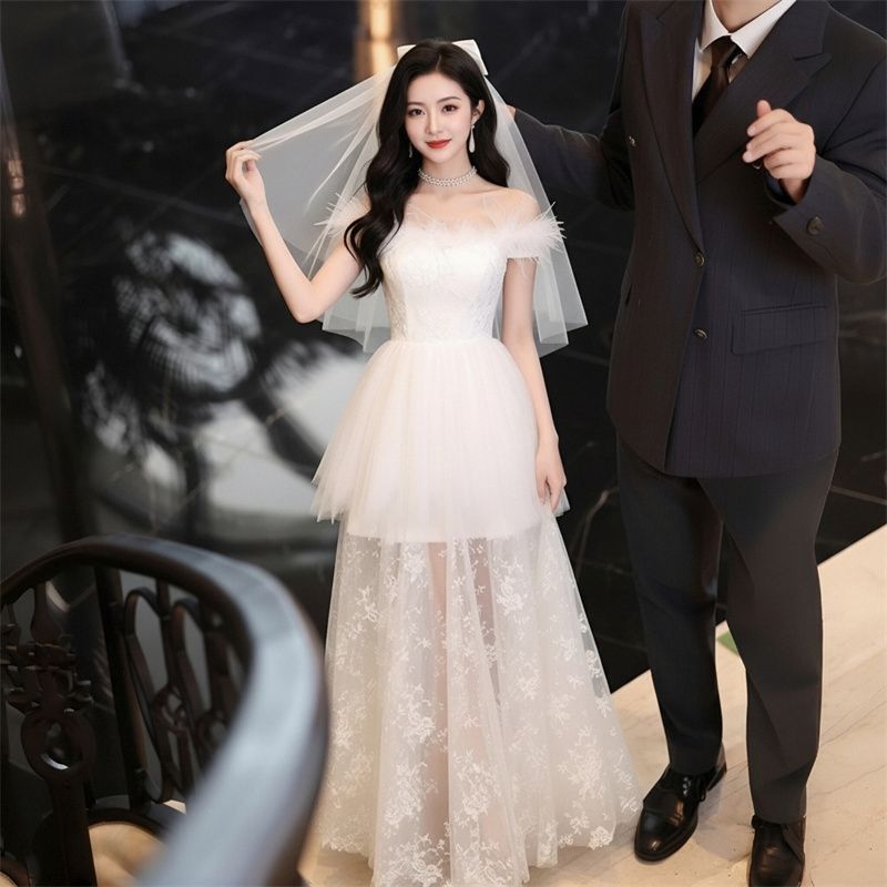 轻奢蕾丝宴会晚装裙一字肩羽毛抹胸收腰大摆显瘦长款仙气婚纱长裙图片
