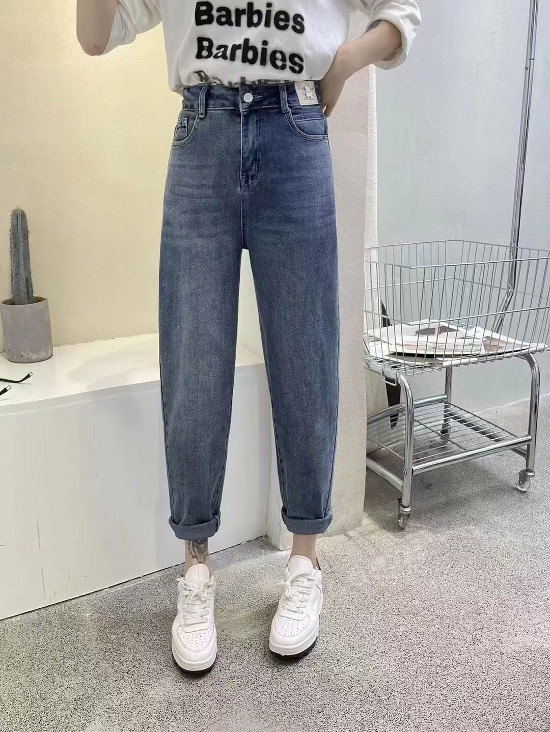 春季新款a99品牌8819半松紧腰小熊标弹力牛仔裤女哈伦萝卜休闲裤