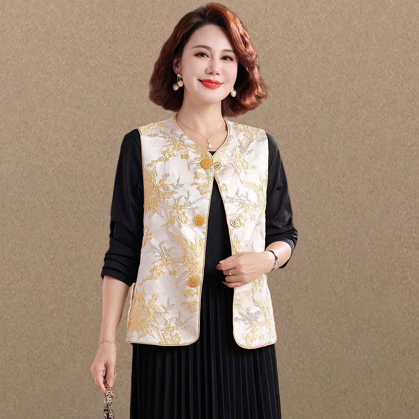 妈妈秋装提花马甲外套2025新款中老年女装春秋坎肩背心两件套裙子