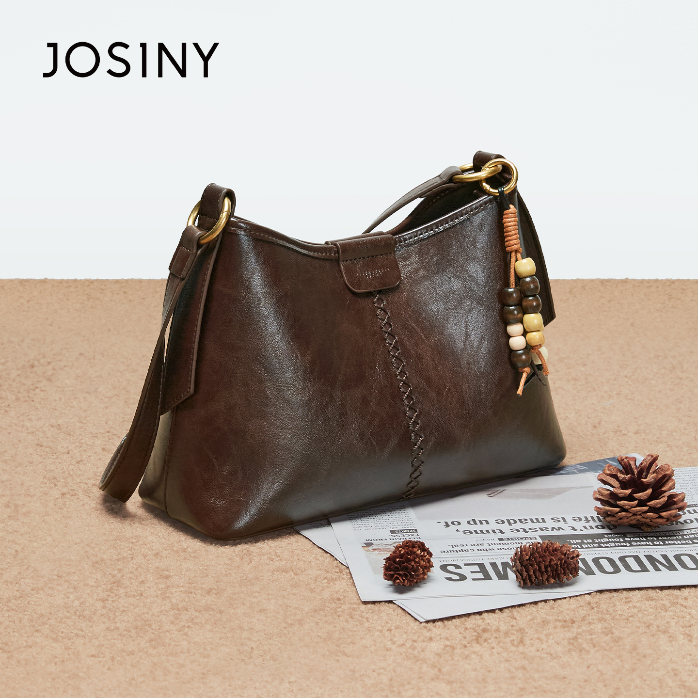 卓诗尼包包女2025秋冬新款流行通勤单肩包女百搭高级感斜挎水桶包