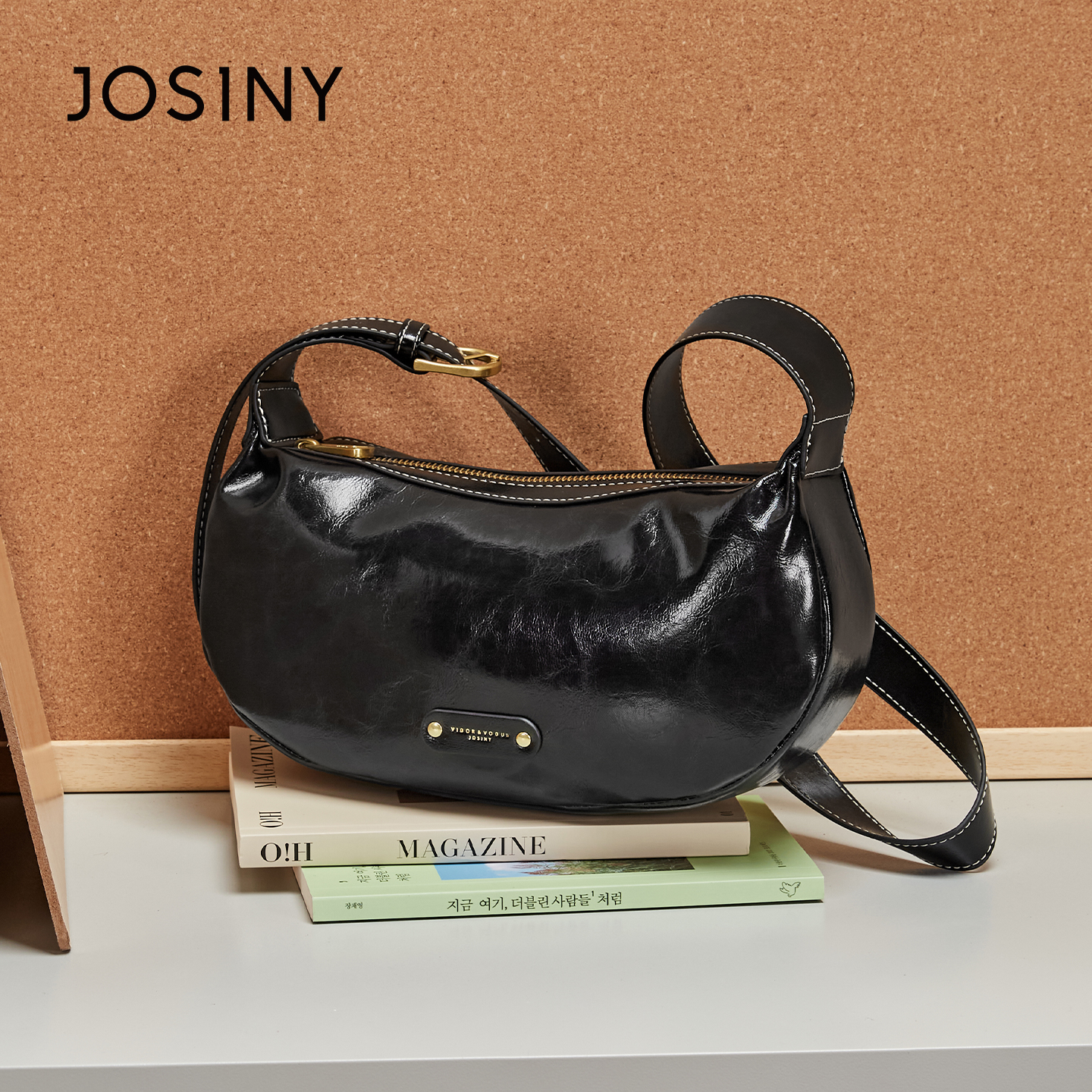 卓诗尼包包2025新款黑色高级质感法棍包女轻奢小众设计单肩斜挎包