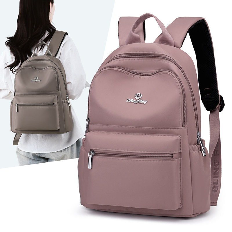 简约防水双肩包女包大容量轻便通勤书包休闲旅行小背包大学生书包