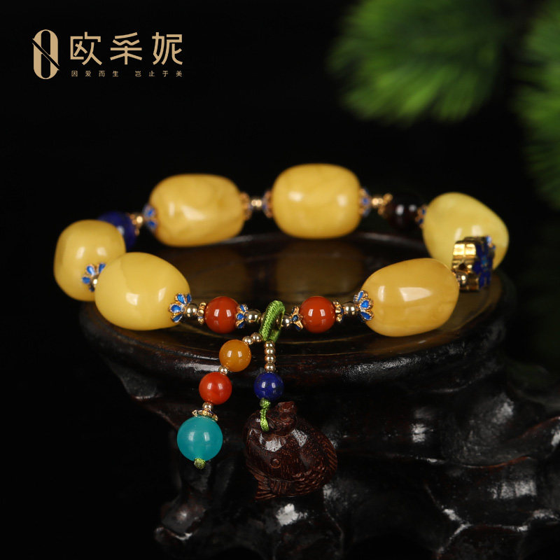 欧采妮天然蜜蜡多宝手串青金石南
