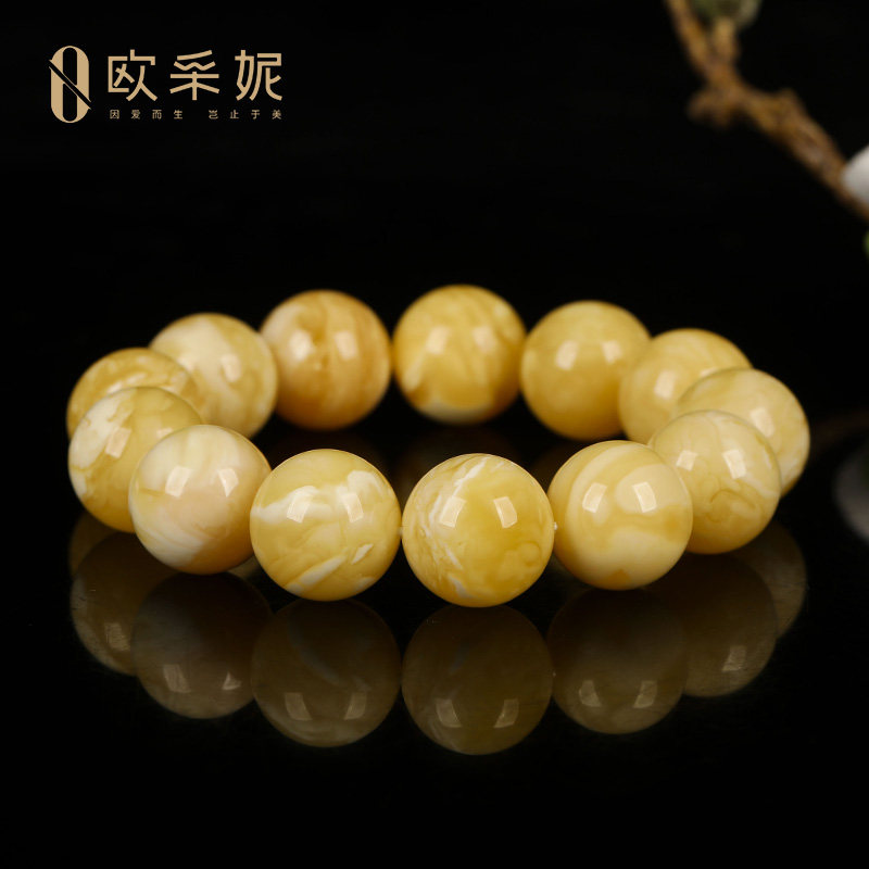 欧采妮俄料白花蜜蜡手串
