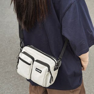 户外休闲多口袋帆布斜挎包男女通用简约旅游小方包尼龙布纯色单肩