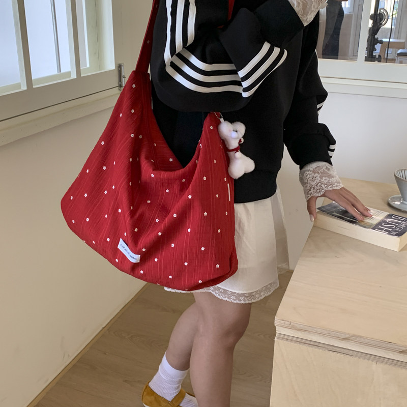 2025夏季新款波点帆布包简约女大容量包包大学生上课小众单肩包